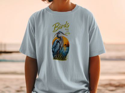 Light blue t-shirt with a heron graphic and the text "Birds Make Life Better".