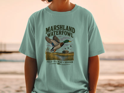 T-shirt with marshland waterfowl graphic and text: Field Flyway Season.
