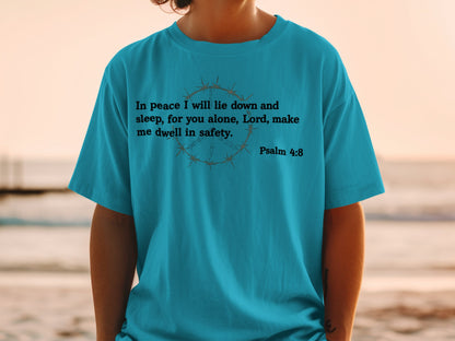 Turquoise t-shirt with Psalm 4:8 text and barbed wire peace symbol graphic.