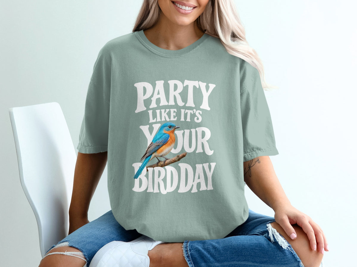 T-shirt with text "PARTY LIKE IT'S YOUR BIRDDAY" and a blue bird.