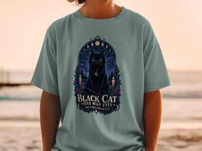 Black cat with star map eyes and crescent moon necklace, surrounded by celestial elements.
