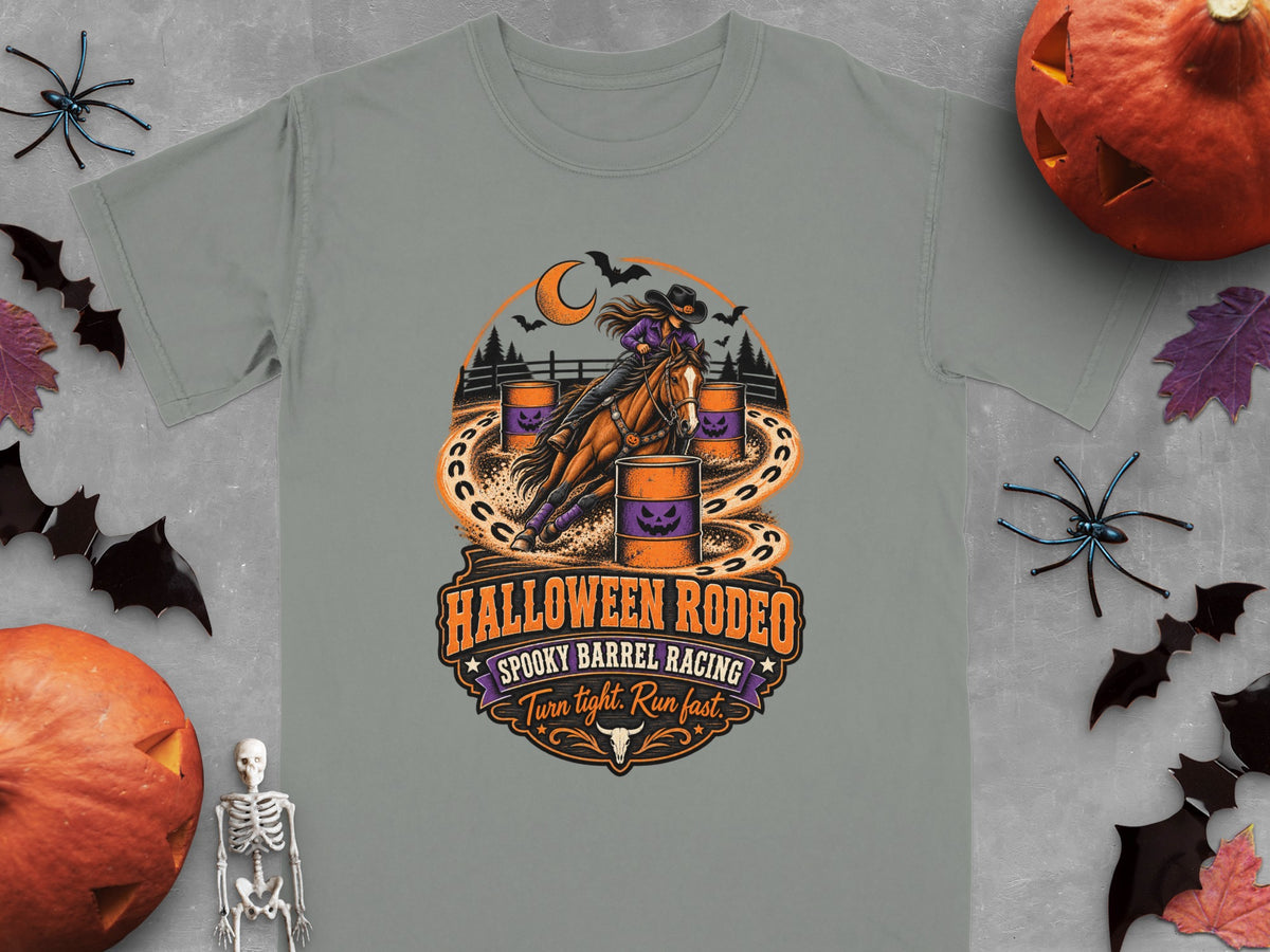 Grey t-shirt with "Halloween Rodeo Spooky Barrel Racing" graphic of a cowgirl and horse.