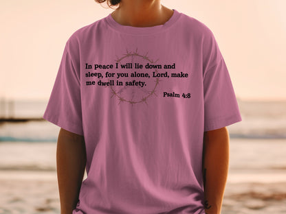 Pink t-shirt with text "In peace I will lie down and sleep, for you alone, Lord, make me dwell in safety. Psalm 4:8".