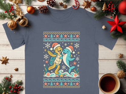 Turtle and dolphin with Santa hats on a sweater pattern with snowflakes and stars.