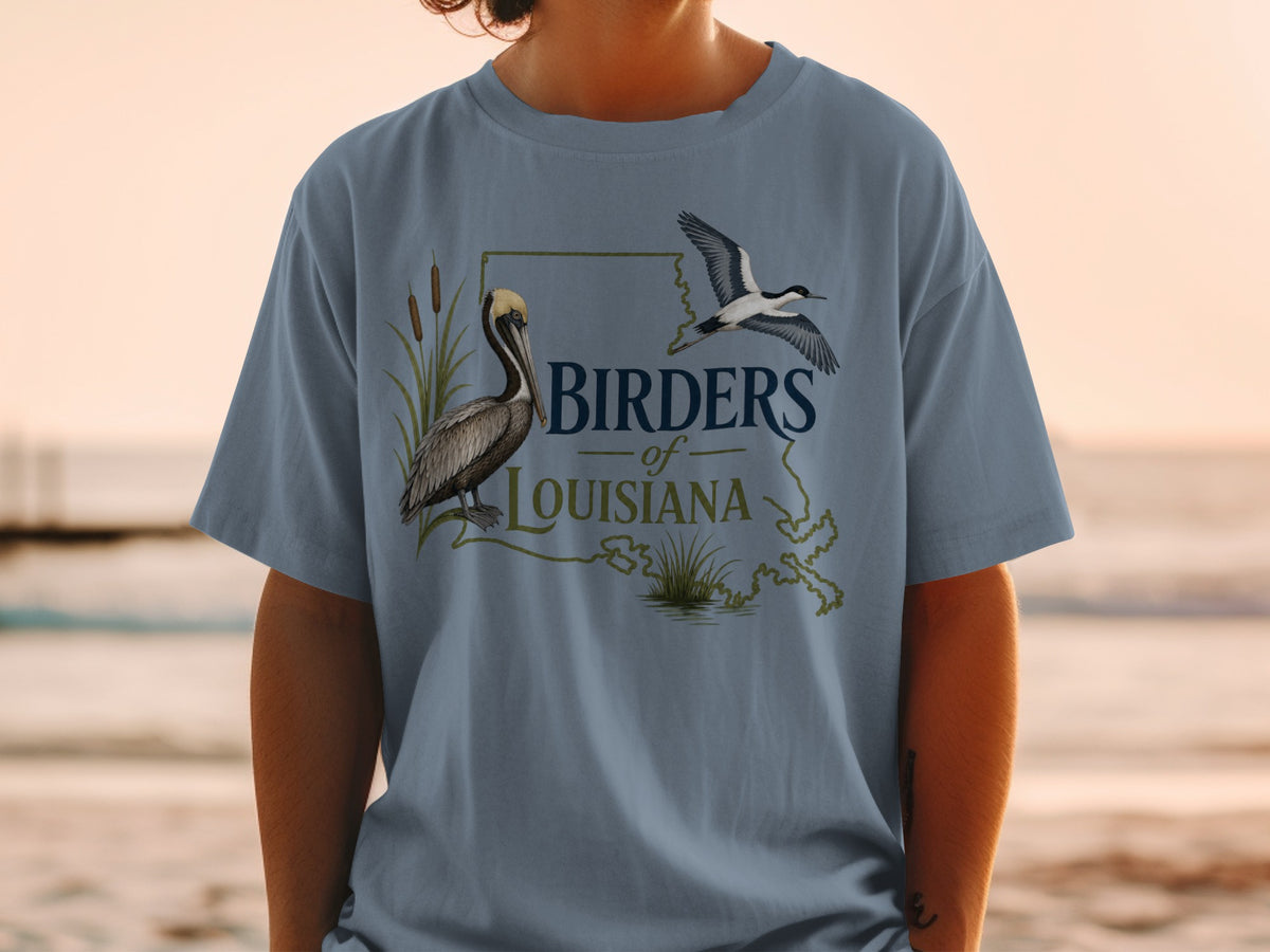 Birders of Louisiana t-shirt with pelican, flying bird, and outline of Louisiana.