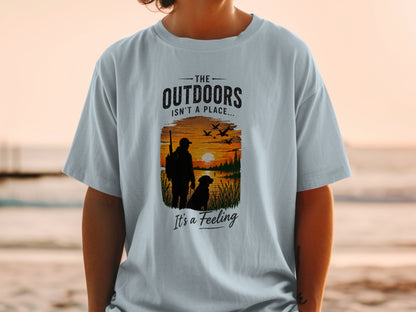 Light blue t-shirt with graphic: "The Outdoors Isn't a Place... It's a Feeling"