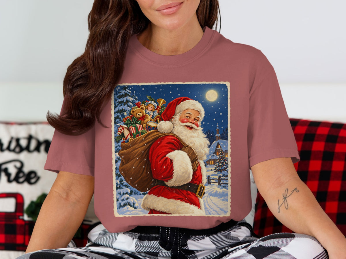 Santa Claus carrying a sack of toys through a snowy village under a full moon.