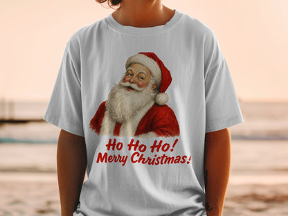 Santa Claus graphic with text "Ho Ho Ho! Merry Christmas!" on a white t-shirt.