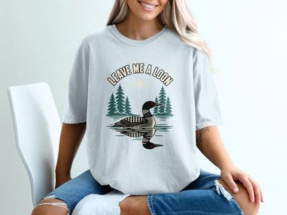 Light blue t-shirt with "LEAVE ME A LOON" text and loon graphic.