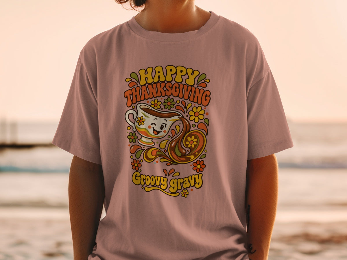 T-shirt with "Happy Thanksgiving Groovy Gravy" text and a smiling gravy boat graphic.