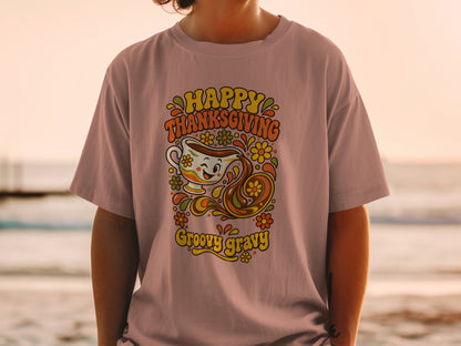 T-shirt with "Happy Thanksgiving Groovy Gravy" text and a smiling gravy boat graphic.