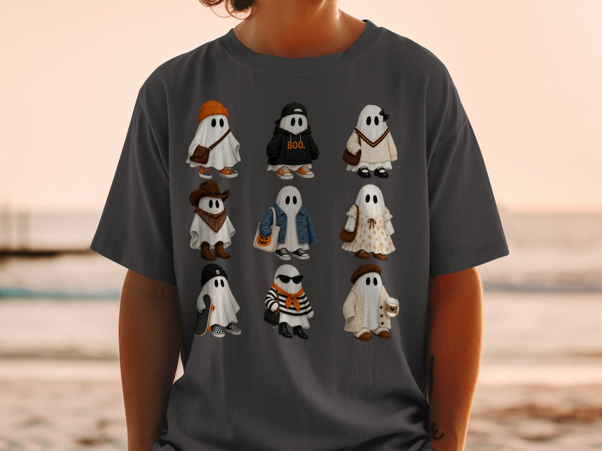 Nine illustrated ghosts in various outfits on a t-shirt.