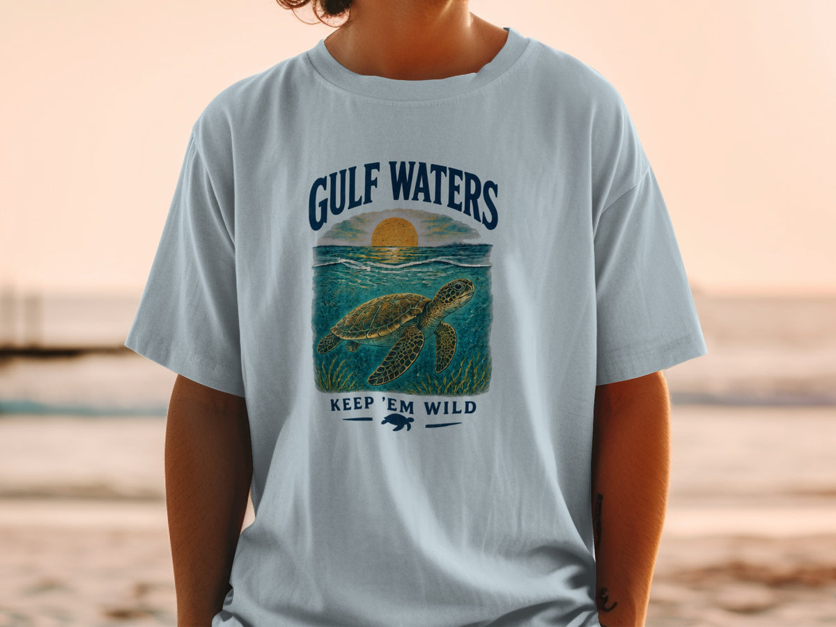 Light blue t-shirt with "Gulf Waters" and sea turtle graphic.