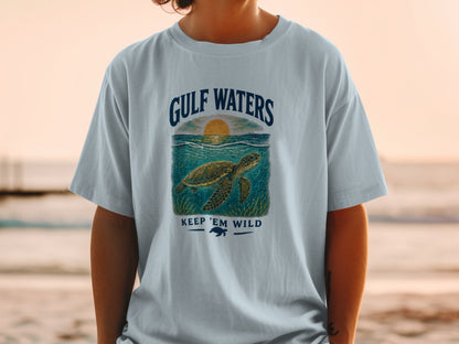 Light blue t-shirt with "Gulf Waters" and sea turtle graphic.