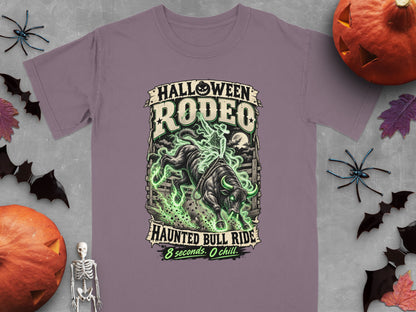 T-shirt with "Halloween Rodeo Haunted Bull Ride" text and spooky bull graphic.