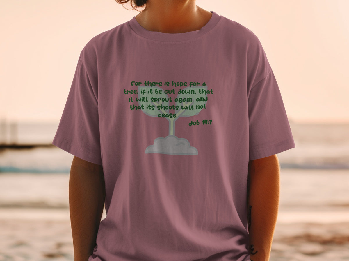 Mauve t-shirt with green text "For there is hope for a tree, if it be cut down, that it will sprout again, and that its shoots will not cease. Job 14:7"