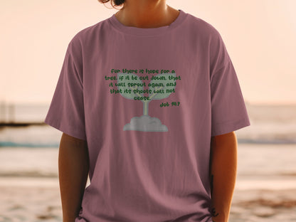 Mauve t-shirt with green text "For there is hope for a tree, if it be cut down, that it will sprout again, and that its shoots will not cease. Job 14:7"