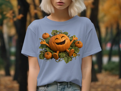 T-shirt with a smiling pumpkin character surrounded by vines and smaller pumpkins.
