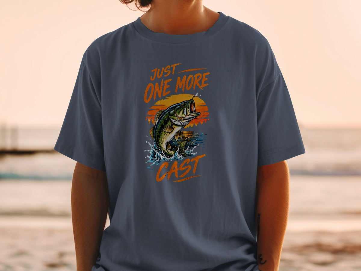 T-shirt graphic of bass fish jumping from water with text "JUST ONE MORE CAST."