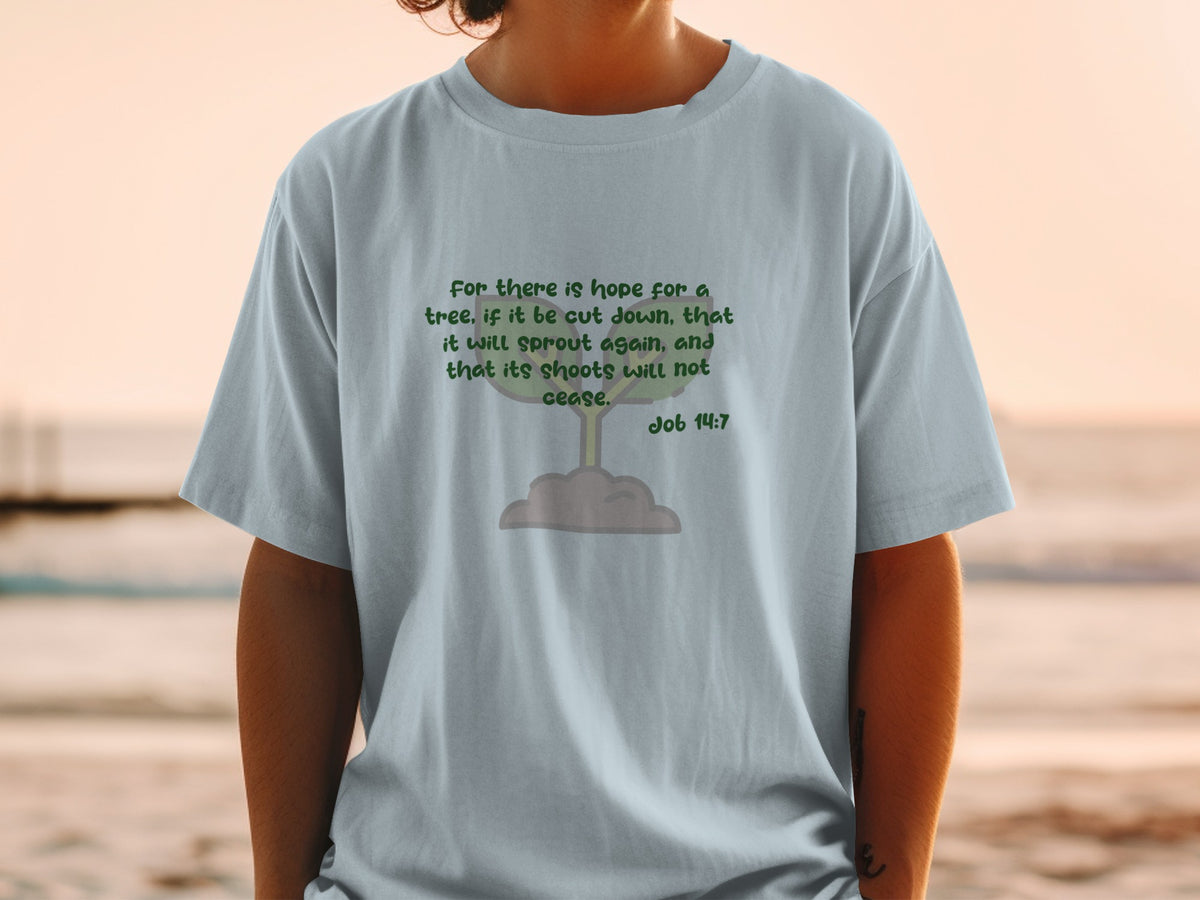 T-shirt with green text and a simple tree graphic referencing Job 14:7.