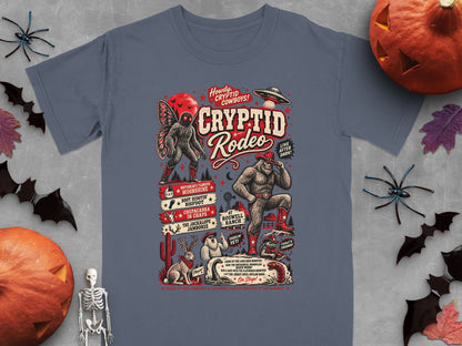 T-shirt with Cryptid Rodeo design featuring Bigfoot, Mothman, Jackalope, and other cryptids.