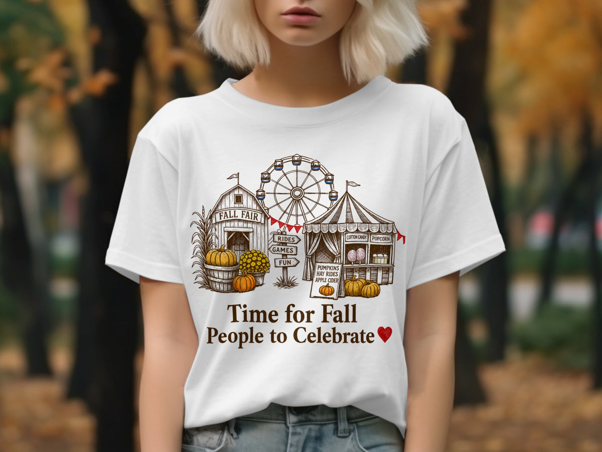 White t-shirt with Fall Fair graphic including Ferris wheel, barn, and food stalls.