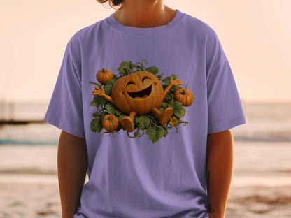 Happy cartoon pumpkin surrounded by smaller pumpkins and green vines on a purple t-shirt.