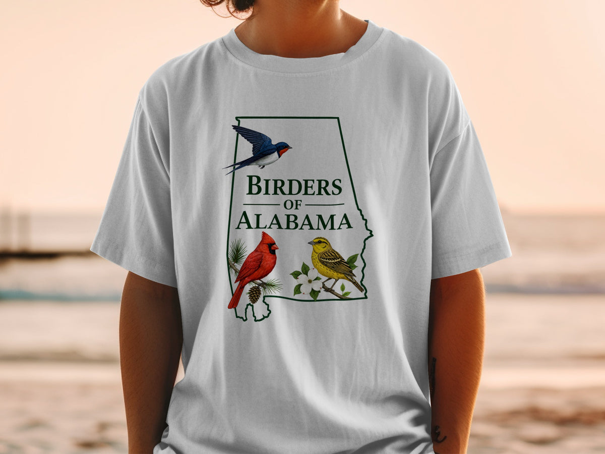 T-shirt graphic with state outline and text "Birders Of Alabama" with birds.