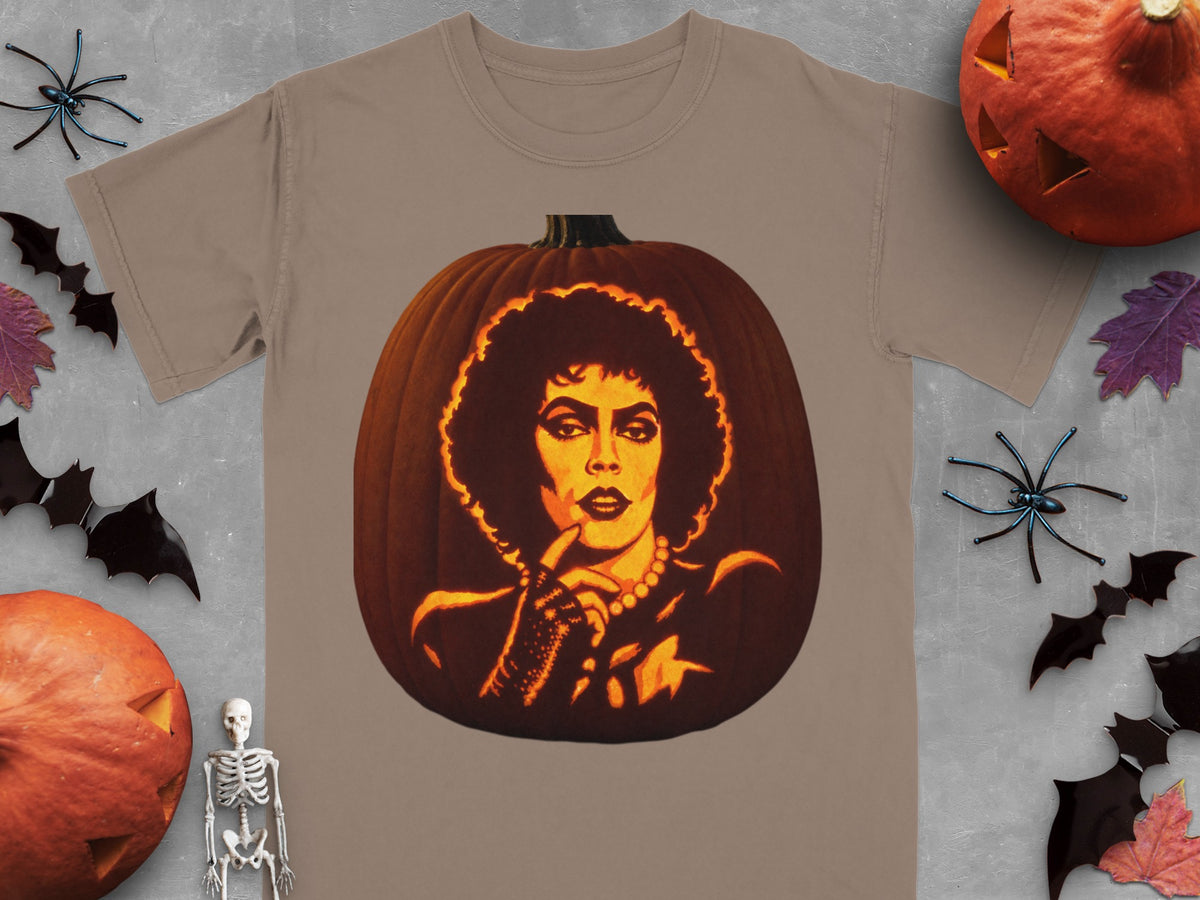 Brown t-shirt featuring a carved pumpkin graphic of Frank-N-Furter from The Rocky Horror Picture Show.