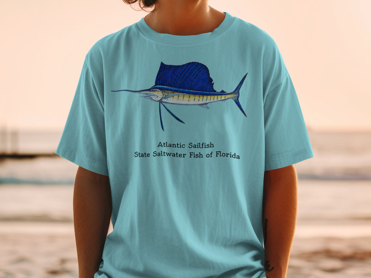 Teal t-shirt with an illustration of an Atlantic Sailfish and text.