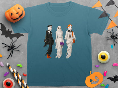 Three ghosts in fashionable outfits with bags and accessories, on a blue t-shirt.