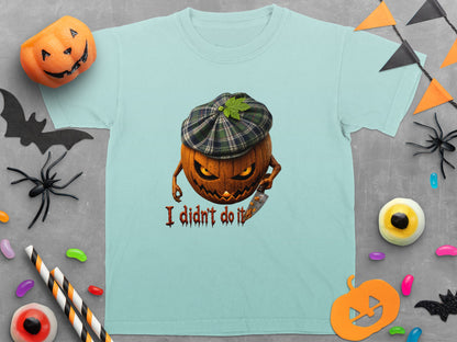 Light blue t-shirt with a spooky jack-o'-lantern wearing a tartan hat and holding a knife.