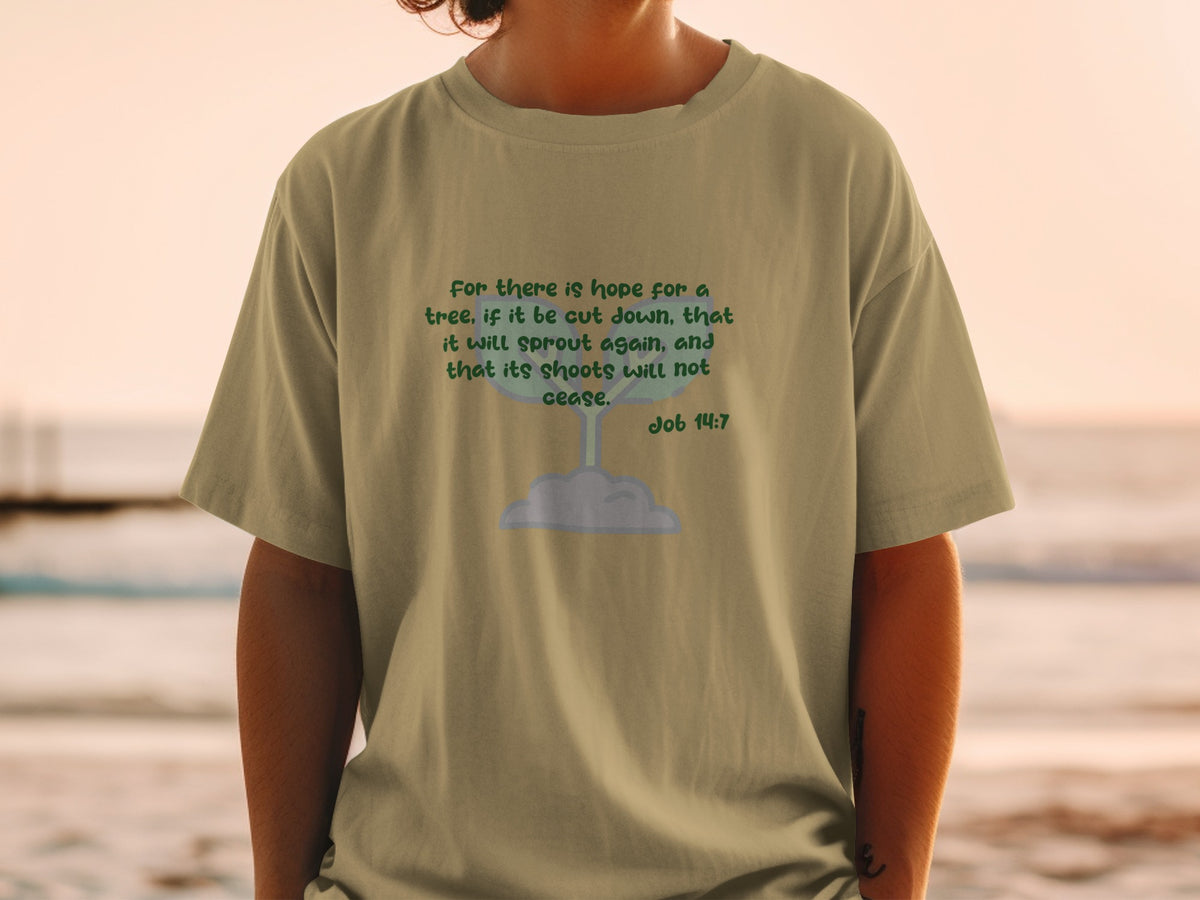 T-shirt with green text quoting Job 14:7 and graphic of a sprouting plant.