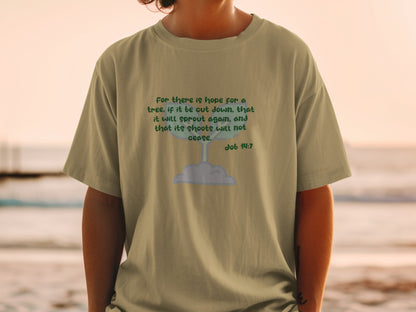 T-shirt with green text quoting Job 14:7 and graphic of a sprouting plant.
