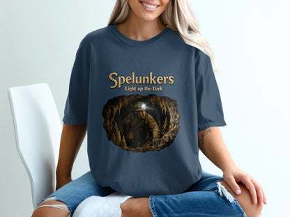 Spelunkers Light up the Dark t-shirt with cave explorer graphic.