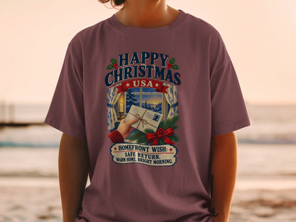 T-shirt graphic with "Happy Christmas USA" text and winter scene.