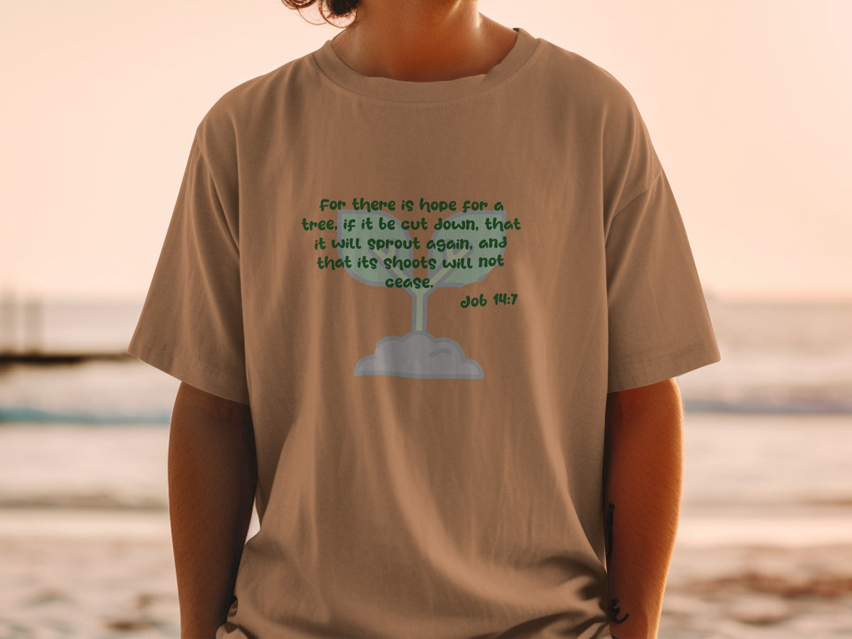 Brown t-shirt with green text about hope and sprouts from Job 14:7.