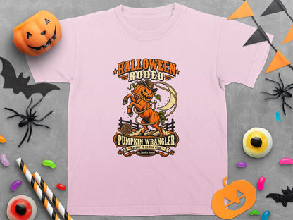 Pink t-shirt with Halloween Rodeo graphic featuring a pumpkin horse and text.