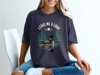 Dark blue t-shirt with "LEAVE ME A LOON" text and loon graphic.