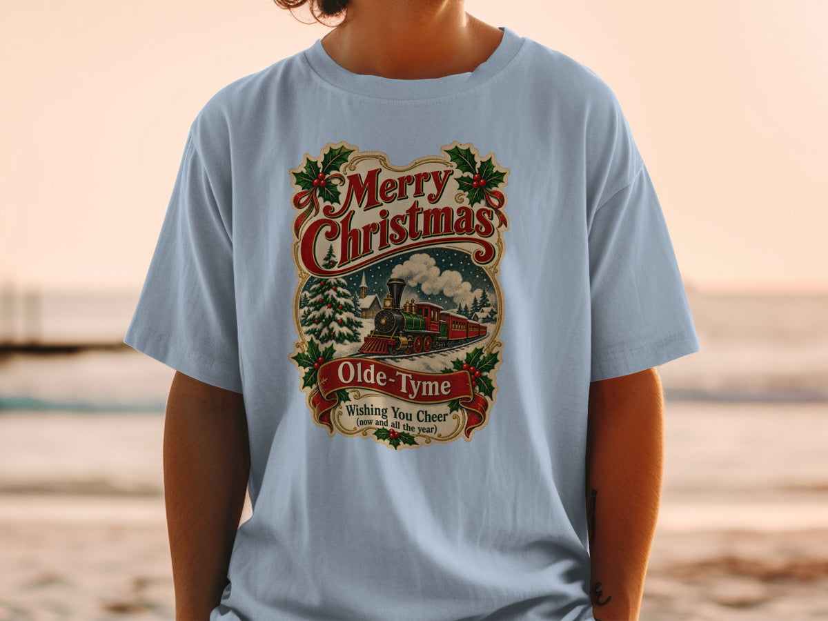 Light blue t-shirt with vintage Christmas train design and text.