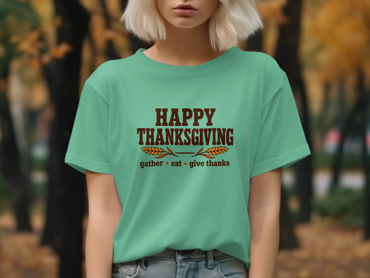 Teal t-shirt with "Happy Thanksgiving" and "gather eat give thanks" text.