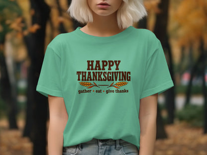 Teal t-shirt with "Happy Thanksgiving" and "gather eat give thanks" text.