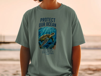 Green t-shirt with "PROTECT OUR OCEAN" and sea turtle graphic.