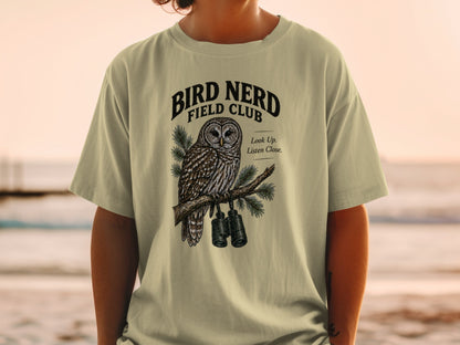 T-shirt with "Bird Nerd Field Club" text, owl, and binoculars graphic.
