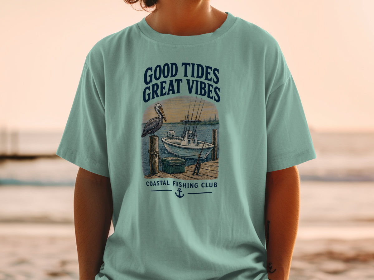 Coastal Fishing Club graphic with boat, pelican, and text "Good Tides Great Vibes."