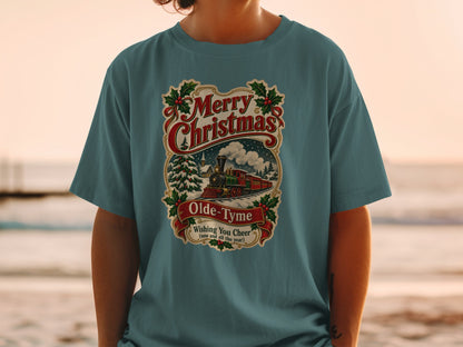 Teal t-shirt with vintage Merry Christmas train design and text.