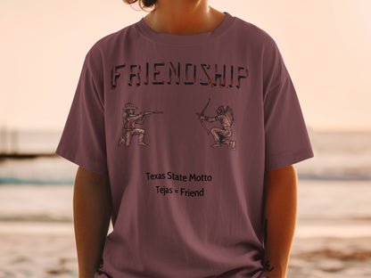T-shirt with "FRIENDSHIP," man with rifle, Native American with bow, "Texas State Motto," and "Tejas = Friend."