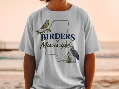 White t-shirt with "Birders of Mississippi" text, a yellow warbler and heron.
