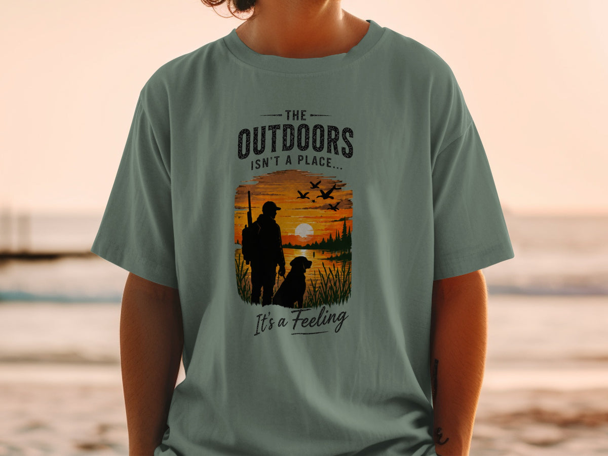 T-shirt with "The Outdoors Isn't a Place... It's a Feeling" and a hunting scene.