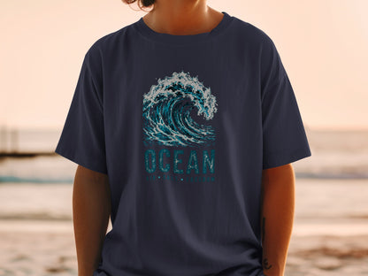 Navy t-shirt with a graphic of a breaking ocean wave and the word "OCEAN".